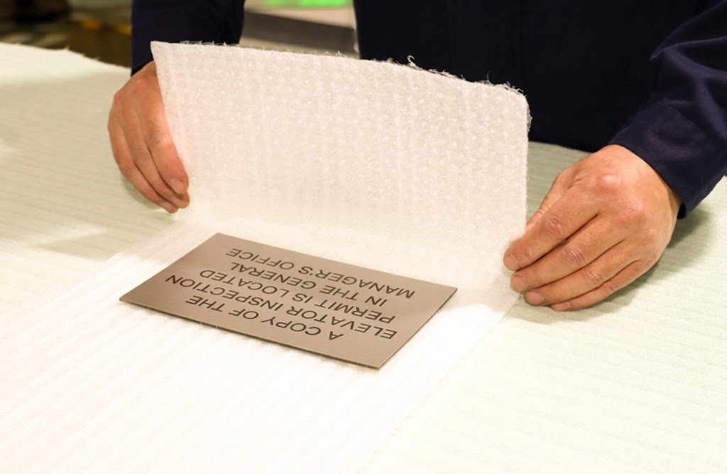 Rowmark Braille signs